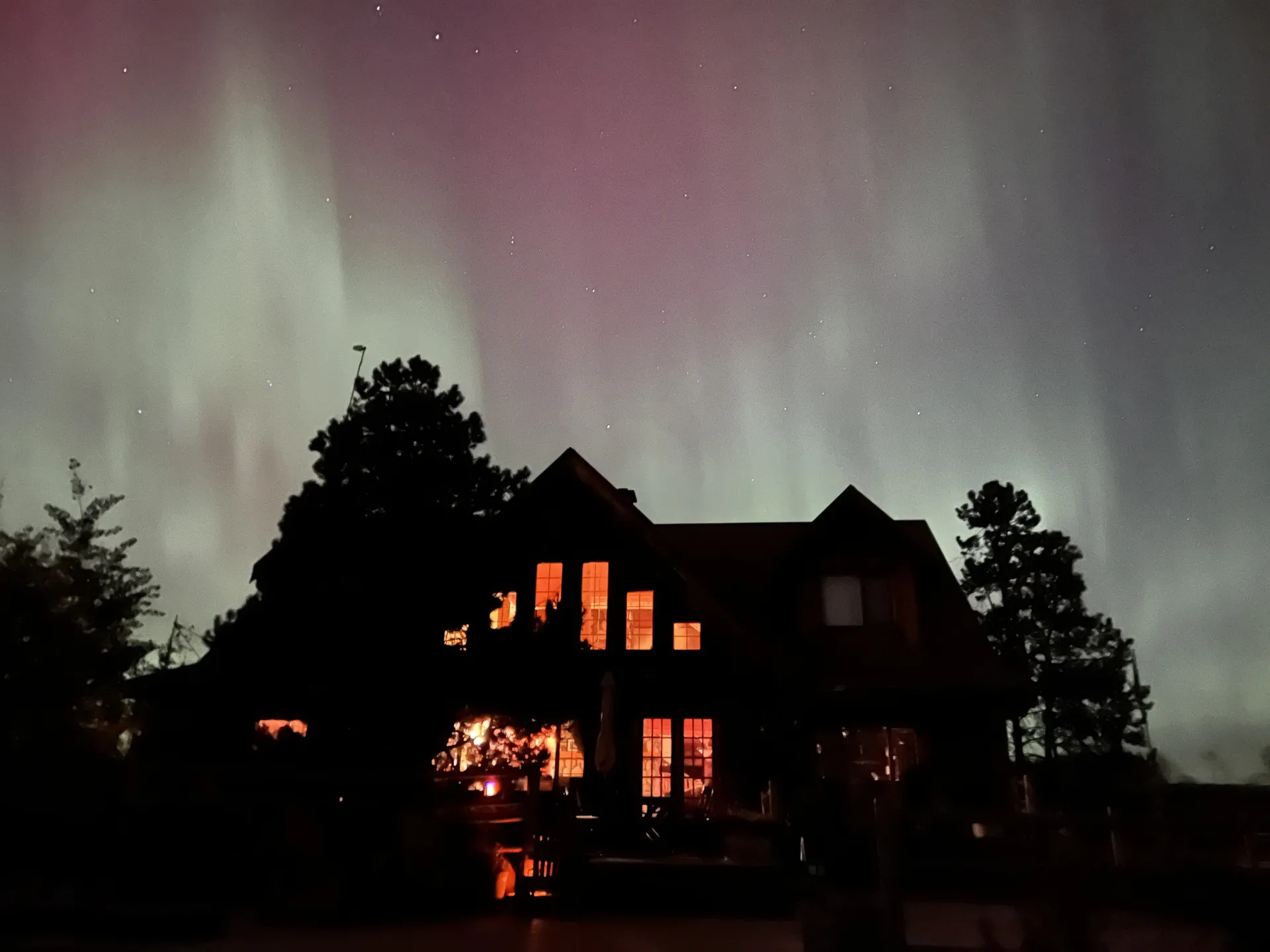 Aurora Borealis over the lodge at Siwash Lake