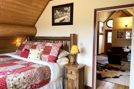 King bed in the Ranch loft suite bedroom