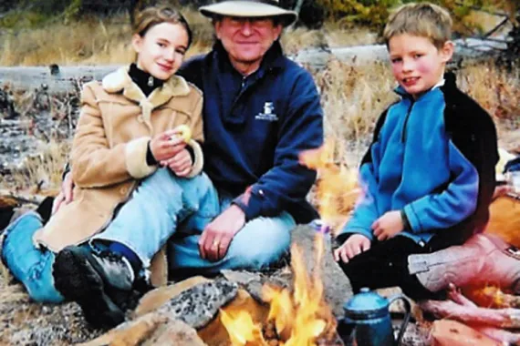 Snuggle up by the campfire at the Siwash River Outpost.