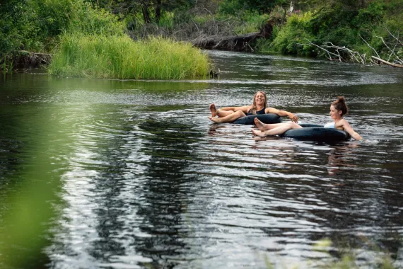 Try lazy river inner tube floats on your wilderness safari at Siwash Lake.