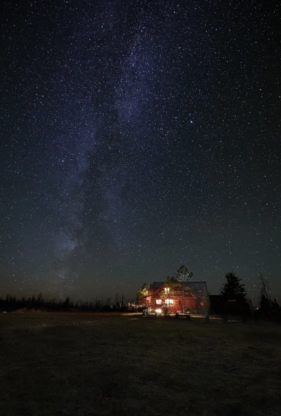 Spectacular star gazing at Siwash Lake with the Milky way over the lodge
