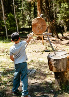 Warming up with throwing axes for the Marksmanship program at Siwash Lake Wilderness Resort