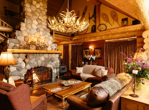 An authentic ranch ambience in the great room of the luxury lodge at Siwash Lake