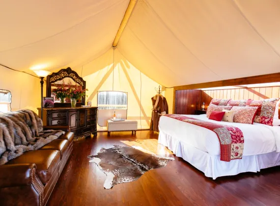 Luxury tent interior shows the best glamping in Canada at Siwash Lake luxury ranch resort